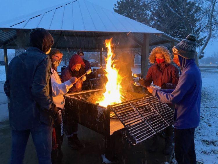Roasting marshmallows during a snow storm