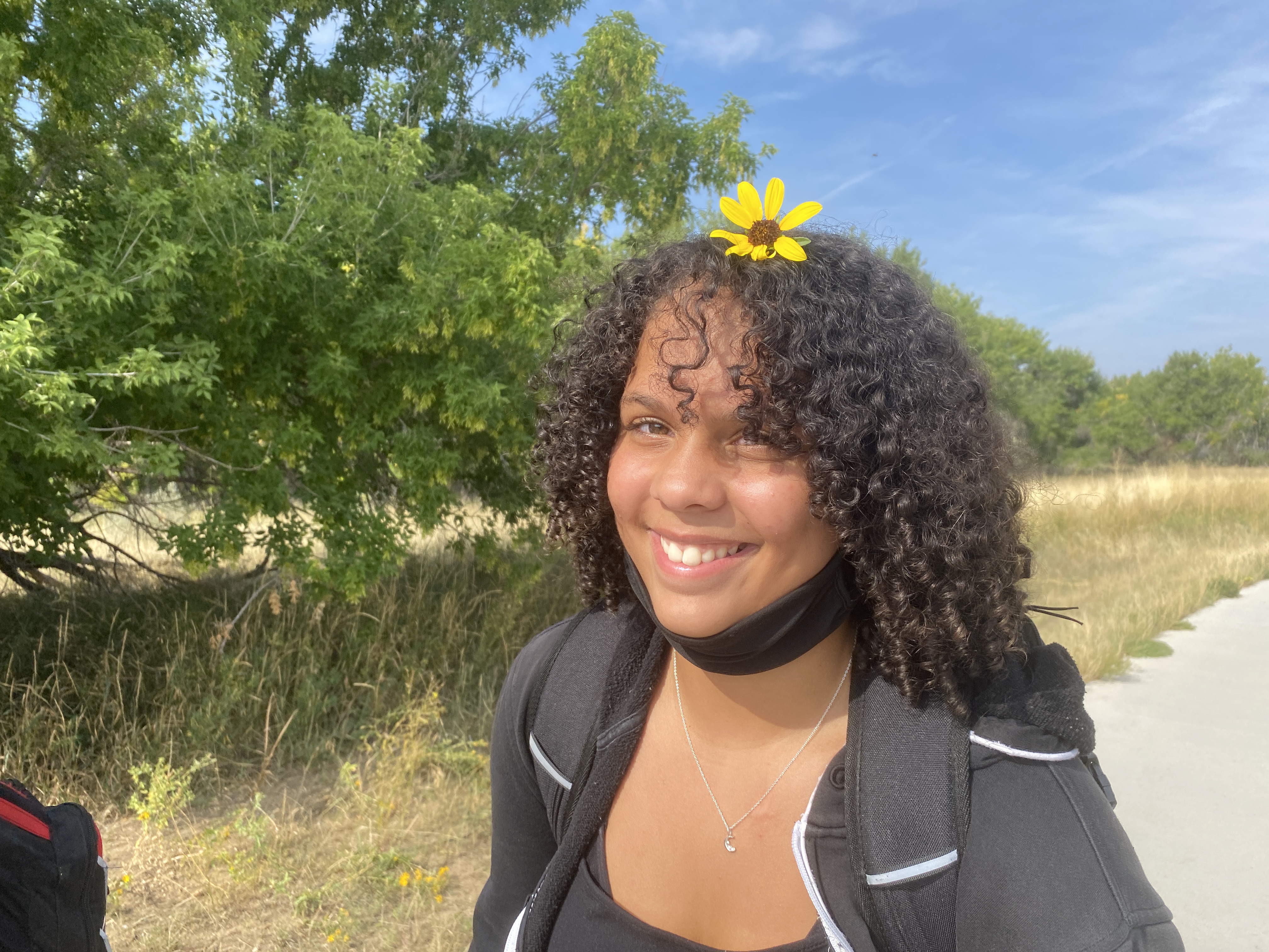 A student with a flower!