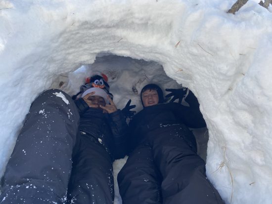 Two AXL students in their quinzee