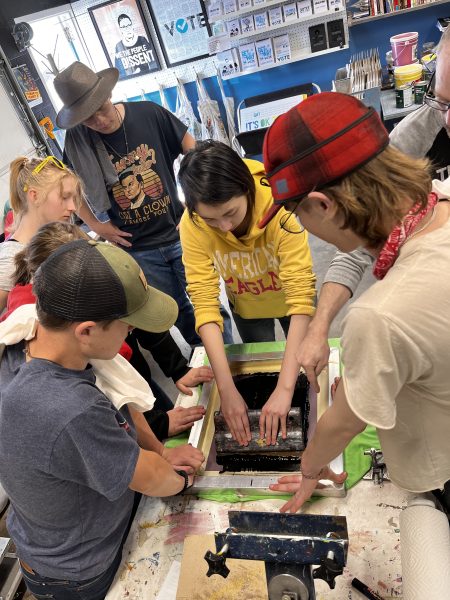 Changemakers learn to screenprint. 