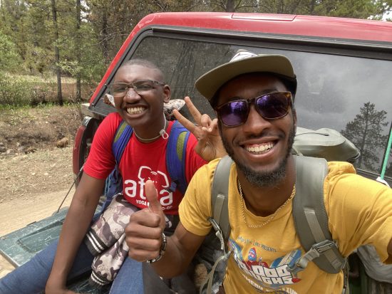 Eeland and a student pose.