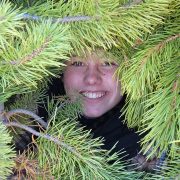 A student hiding amongst the trees like a mischievous wood elf!