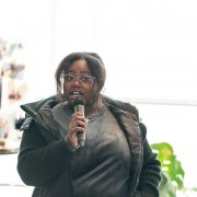 A student speaks at the Outdoor and Environmental Opportunity Fair