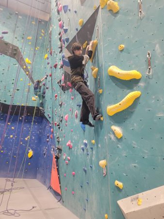 Downpour led Centaurus High students indoors for rock climbing.