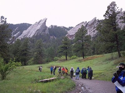 Downpours didn't ruin the adventure as students hike on a trail at Chautauqua.