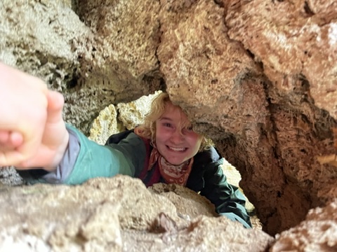 One Changemaker helps another through a rocky section of Labyrinth Canyon.