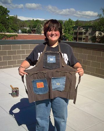 One NVHS student shows off her upcycled apron.