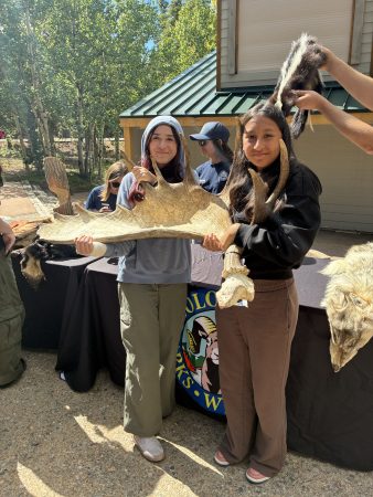 AXL students hold a moose antler during the Skulls and Skins presentation at Golden Gate Canyon State Park.